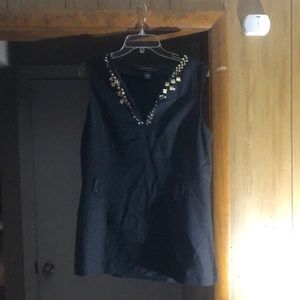 Black no sleeve with gold sequin around neck top. Size L